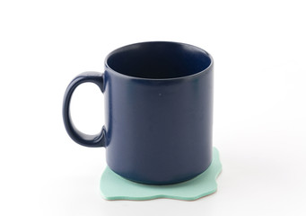 cup and coaster on white background