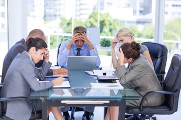 Business team smiling at camera