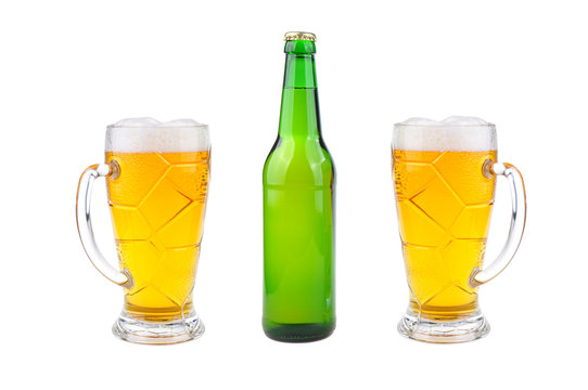 Glass, pint and bottles of beer isolated