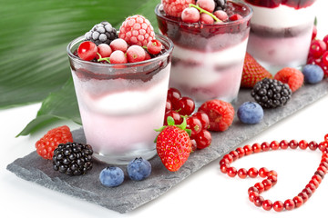 dessert ice cream with berries and beaded necklace