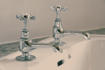 Close-up of Victorian-style basin taps