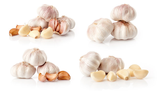 composite of fresh garlic  isolated on white background