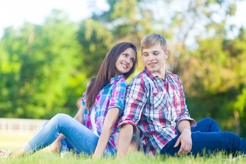 Fototapeta premium Young teen couple in the park
