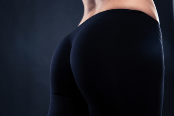 Closeup portrait of a fitness female buttocks