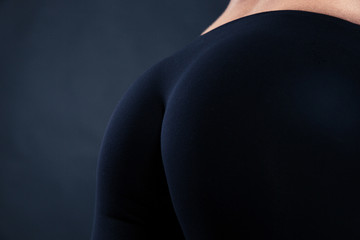 Fototapeta premium Closeup portrait of a fitness female buttocks