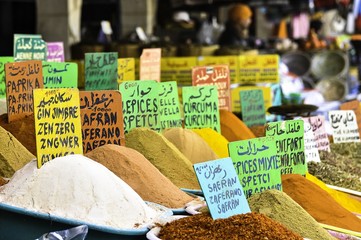 Colorful spices on display in the market place and sold ...