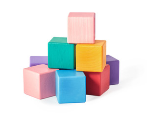 Wooden toy blocks on white background