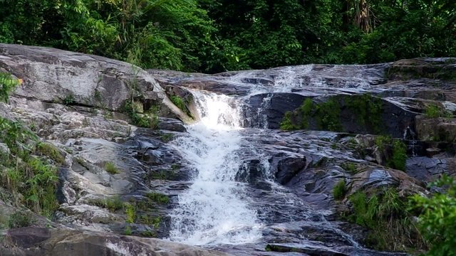 top area of Ton Pliw waterfall scene in the tropical forest of Trang, Thailand
