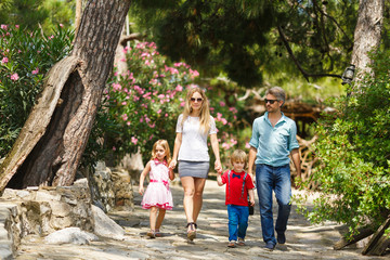 Family walking in the forest