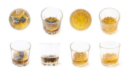 Glass tumbler filled with whiskey isolated