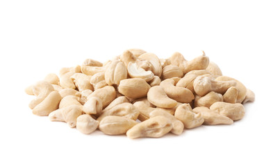 Pile of multiple cashew nuts isolated