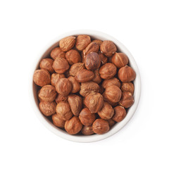 Cup filled with the hazelnuts isolated