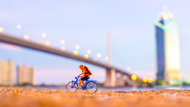 plastic toy standing in front of the river
