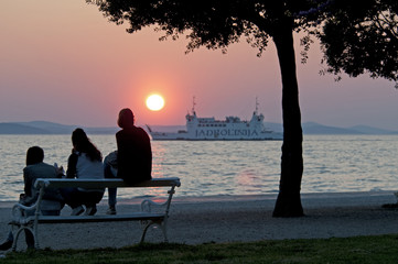 sunset on the horizon above sea