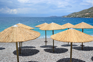 Sun umbrellas on the beach in Loutraki.
