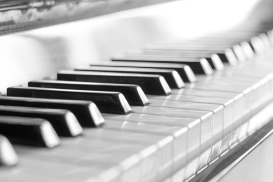 Keyboard of piano. Black and white image with selective focus