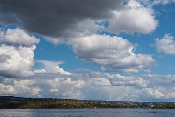 The village on island with Dark Storm Clouds Before Rain.