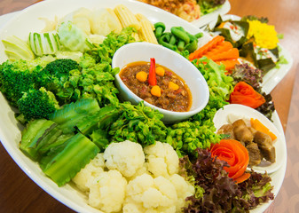 Set of fresh vegetables and spicy sauce