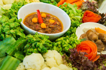 Set of fresh vegetables and spicy sauce