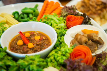 Set of fresh vegetables and spicy sauce