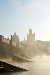 Charles bridge in Prague in the morning mist © arvelius