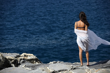 Fototapeta na wymiar Beautiful Woman On The cliff