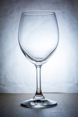Empty wine glass in cool tone
