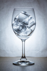 Wine glass with ice in cool tone
