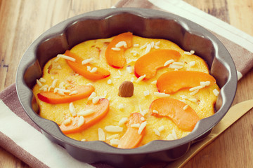 cake with almond and fruits in dish