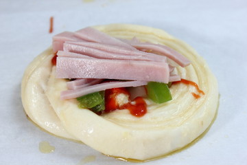 Not yet baked  on baking paper.