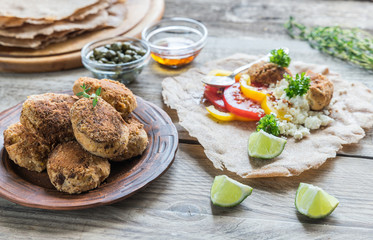 Appetizer with falafel, cottage cheese and vegetables