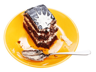 Chocolate cake on orange plate