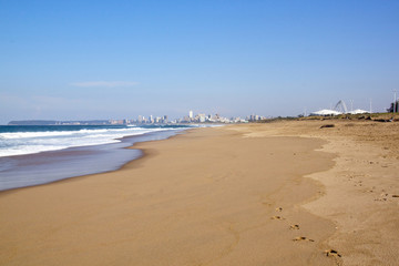 Empty Durban Beach at Low Tide Against City Skyline
