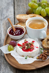 gourmet breakfast- camembert with berry jam, toast, coffee 