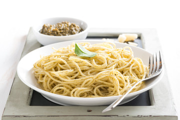 plate of spaghetti with pesto