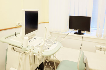 Interior of medical room with ultrasound diagnostic equipment
