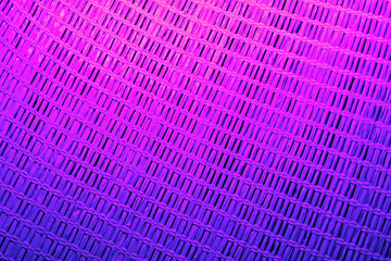 Wooden wickerwork or background in pink-violet tones
