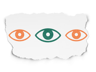 Obraz premium Security concept: eye icon on Torn Paper background