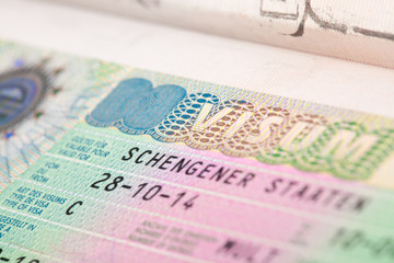 EU Schengen zone visa in passport - close up shot