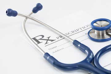 Stethoscope with medical drug prescription on table