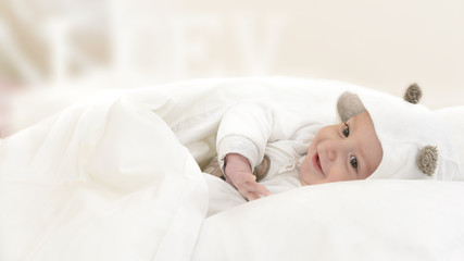 Obraz na płótnie Canvas Happy Baby in Bed