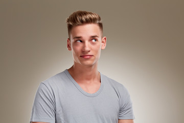 Portrait of male teenager looking to the right corner