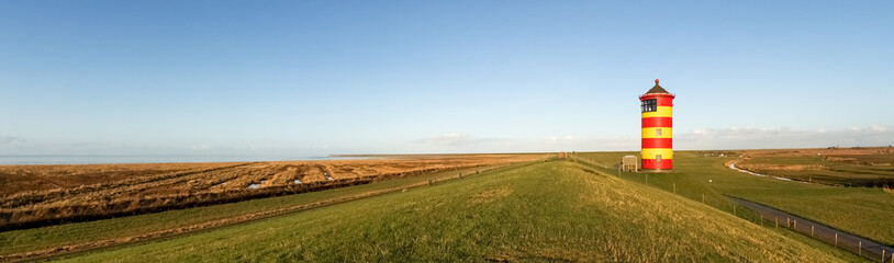 Obraz premium Pilsum, lighthouse at the North sea of Germany.