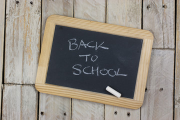 Small blackboard with white chalk