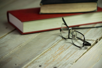 Books on an old wooden surface