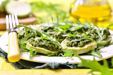 Fried vegetable marrow with sauce pesto.
