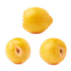 Single yellow mirabelle plum isolated