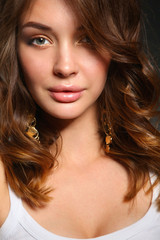 Obraz premium Close up portrait of beautiful young woman face. 