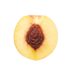 Cut open nectarine half isolated