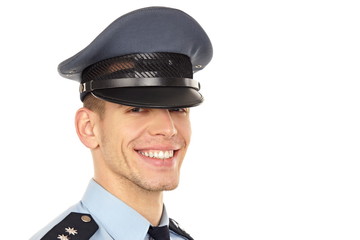 Portrait of smiling young policeman, right you can write some text